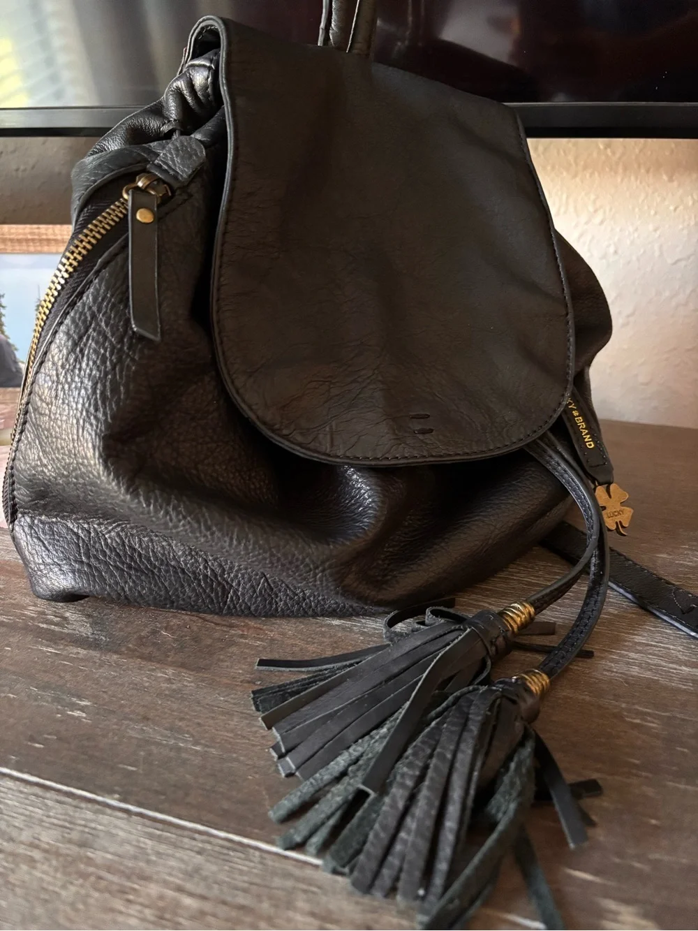 Vintage Super Soft Black Leather Lucky Brand Women’s Backpack with Tassel Accent